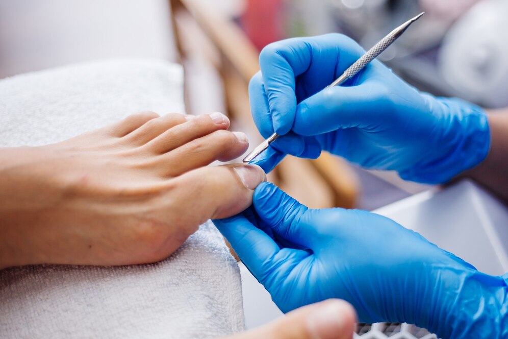 pedicure-process-home-salon-pedicure-foot-care-treatment-nail-process-professional-pedicures-master-blue-gloves-make-pedicure